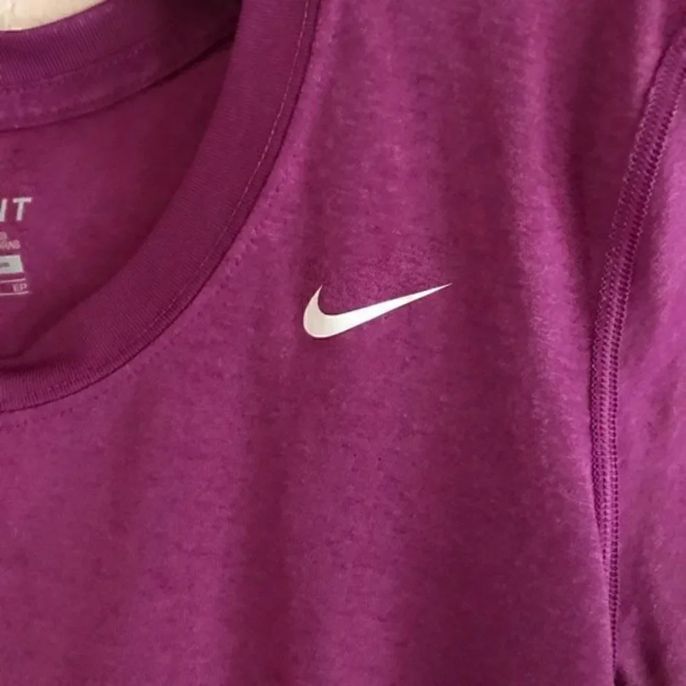 *30off3* NWOT. Nike Dri-Fit Purple Top